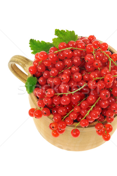 Ceramic cup full of fresh red currant berries. Clipping path included
 Stock photo © brozova