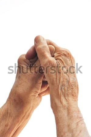 Senior woman's hands isolated on white Stock photo © brozova