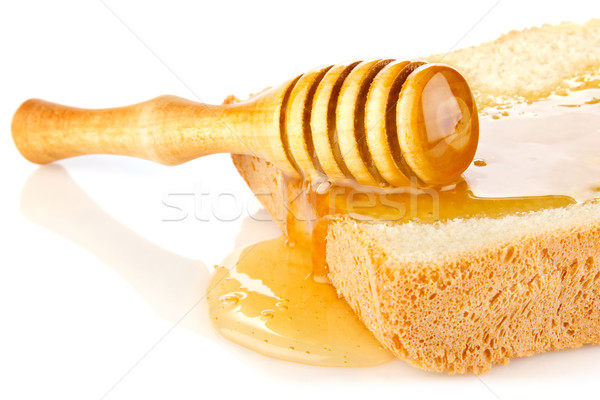 Stock photo: honey on bread slice with dipper