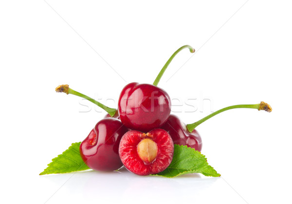 Ripe juicy cherry with green leaf. Stock photo © brulove