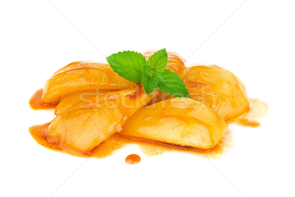 Caramelized pear in cognac sauce with leaf mint Stock photo © brulove