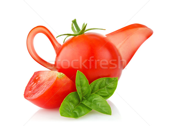 creative conception tomato - sauce-boat with branch of basil Stock photo © brulove