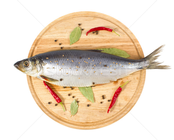 herring with spice on wooden plate Stock photo © brulove