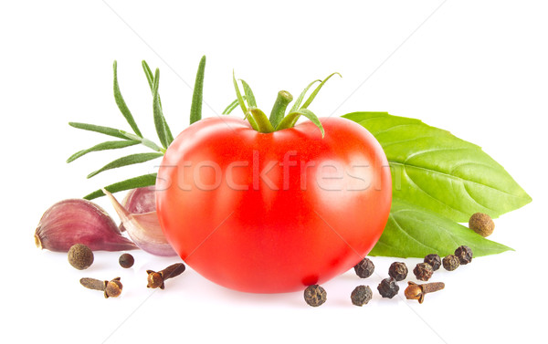 Stock photo: Ripe fresh tomato with herb and garlic