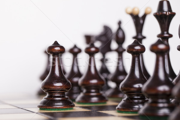 Chess pieces showing competition in business and sport Stock photo © BrunoWeltmann