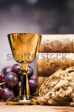 Sacred objects, bible, bread and wine. Stock photo © BrunoWeltmann