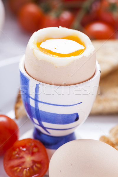 Soft-boiled egg in the morning with toast. In the background of  Stock photo © BrunoWeltmann