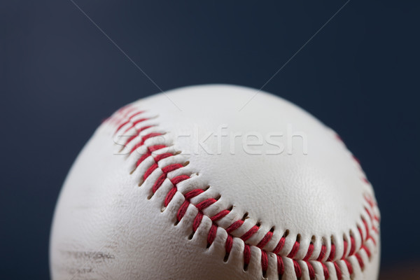 Baseball ball on wooden table Stock photo © BrunoWeltmann