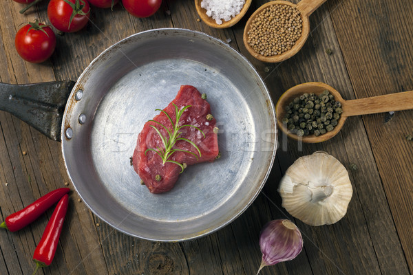Nyers marhahús előkészítés étel hús főzés Stock fotó © BrunoWeltmann