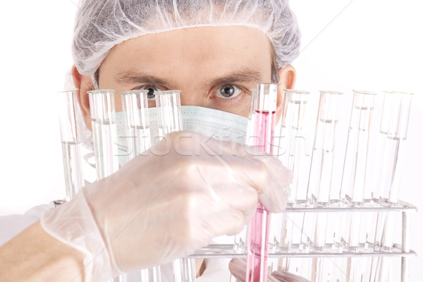 Scientist experimenting with colorfull fluids Stock photo © BrunoWeltmann