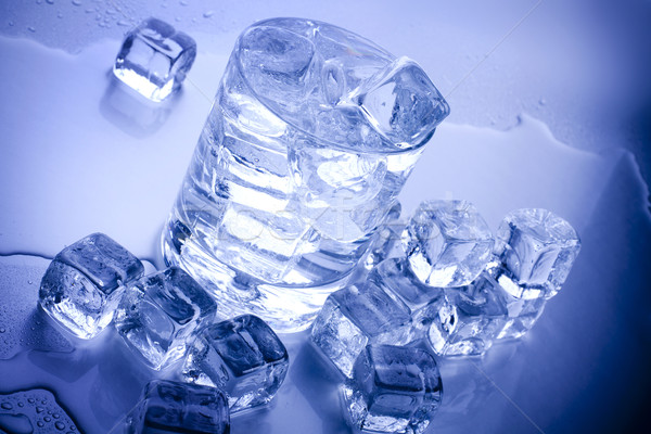 ice cubes in blue background Stock photo © BrunoWeltmann