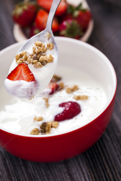 Excellent breakfast. Breakfast cereal with yoghurt and strawberr Stock photo © BrunoWeltmann