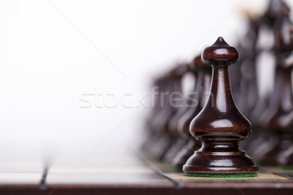 Chess pieces showing competition in business and sport Stock photo © BrunoWeltmann