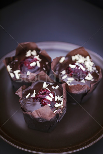 Heerlijk muffins bruin plaat foto Stockfoto © BrunoWeltmann