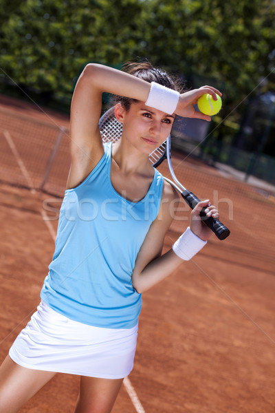 Jeune fille balle de tennis tribunal rouge sport [[stock_photo]] © BrunoWeltmann