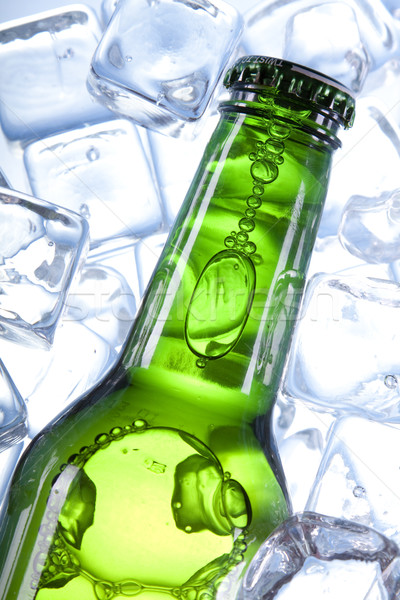 Frío cerveza hielo vidrio burbujas alcohol Foto stock © BrunoWeltmann