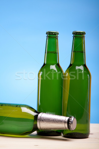 Buena cerveza bar botella oro burbujas Foto stock © BrunoWeltmann