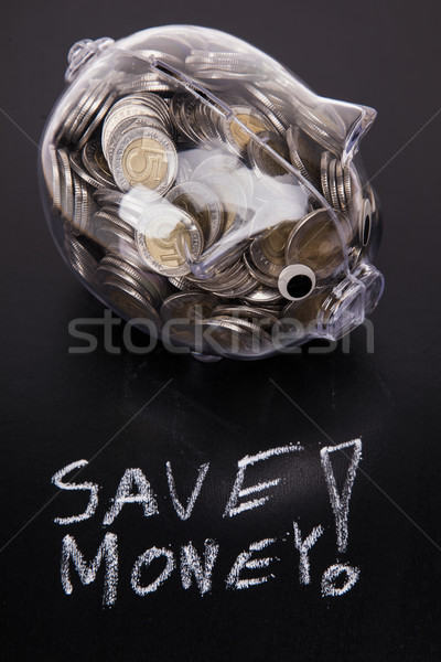 Savings in piggy bank! A lot of money! Stock photo © BrunoWeltmann