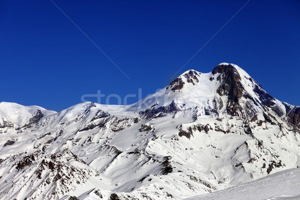 Mount Kazbek at sun winter day Stock photo © BSANI