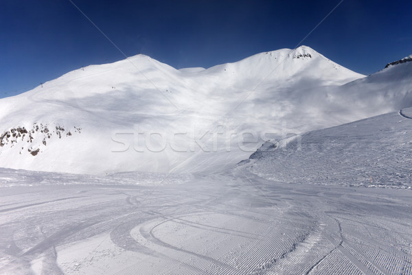 Ski slope with snowmobile trail Stock photo © BSANI