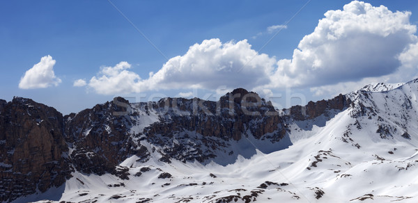 Panorama of snowy mountains in nice sun day Stock photo © BSANI