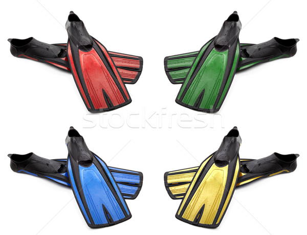Set of multicolored flippers for diving with water drops Stock photo © BSANI