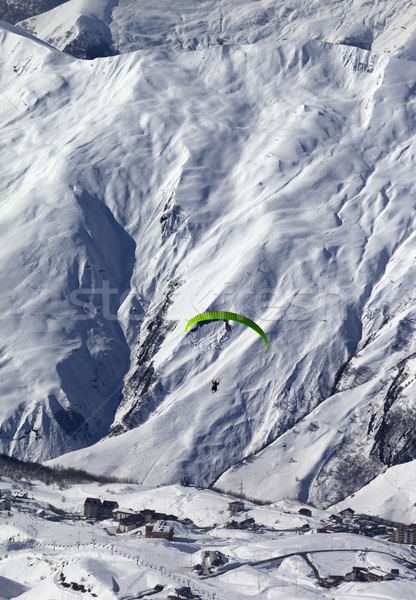 Speed flying in snow mountains at sun day Stock photo © BSANI