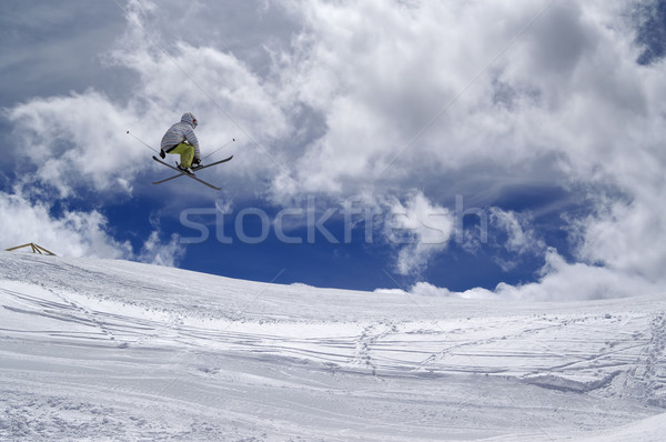 Freestyle ski jumper with crossed skis Stock photo © BSANI