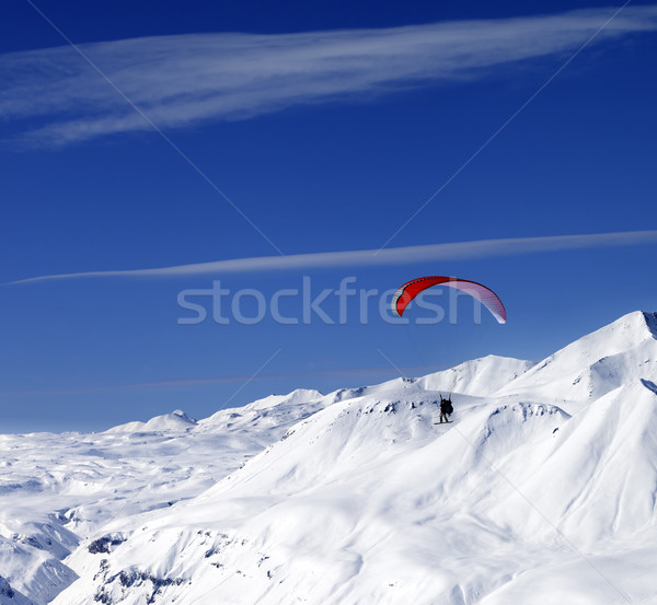 Stock photo: Sky gliding in snowy mountains at nice sun day