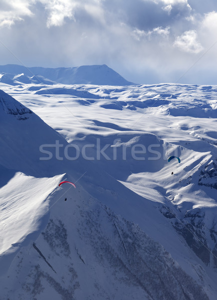 Speed flying in winter evening mountains Stock photo © BSANI