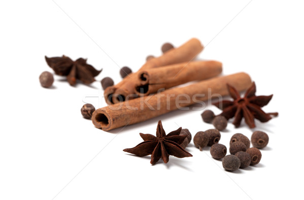Cinnamon sticks, anise stars and black peppercorns Stock photo © BSANI