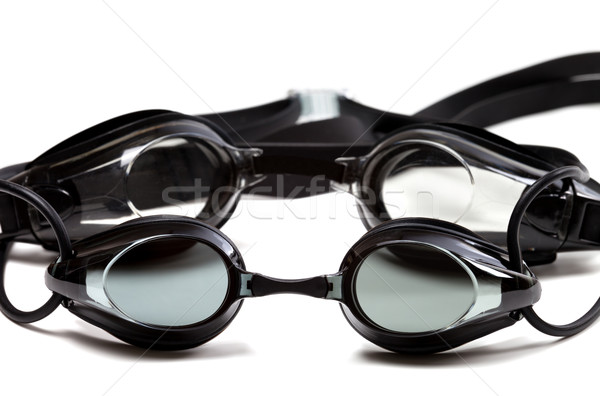 Two black goggles for swimming on white background Stock photo © BSANI