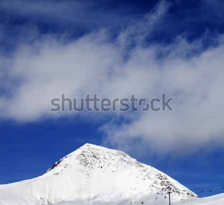 Chair-lift and ski slope at sun wind day Stock photo © BSANI