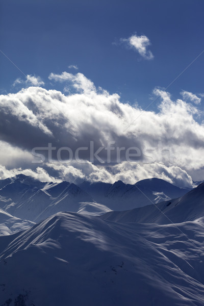 Wieczór światło słoneczne góry mgły widoku stok narciarski Zdjęcia stock © BSANI