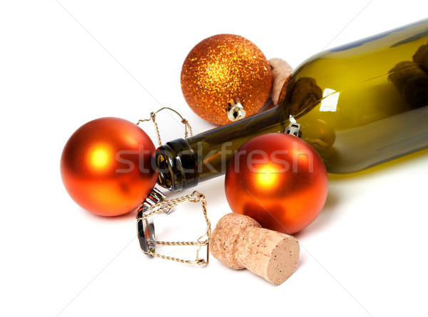 Empty bottle of wine, corks, muselets and Christmas decorations Stock photo © BSANI