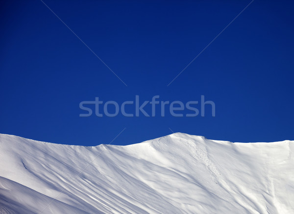 Off-piste slope and blue clear sky in nice winter day Stock photo © BSANI