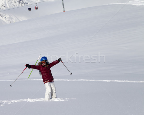 Happy girl on off-piste slope after snowfall at nice sun day Stock photo © BSANI