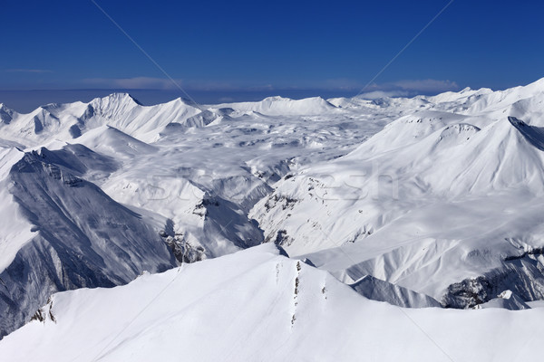 Stock photo: Snowy plateau and off-piste slope