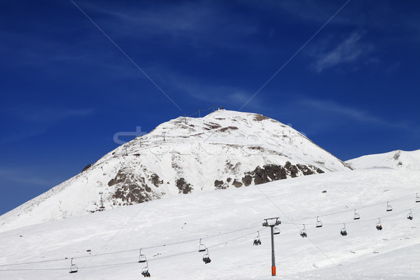 Winter mountains and ski slope at nice day Stock photo © BSANI