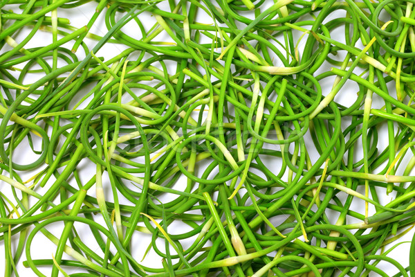 Background of fresh garlic scape Stock photo © BSANI
