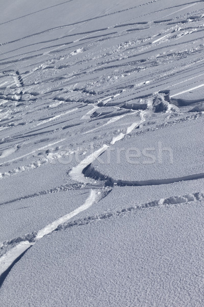 Traces of skis and snowboards in new-fallen snow  Stock photo © BSANI