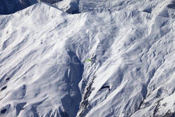 Off-piste slope and paraglider in nice day Stock photo © BSANI