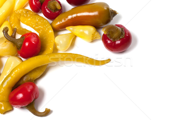 Mix of hot pickled peppers isolated on white background Stock photo © BSANI