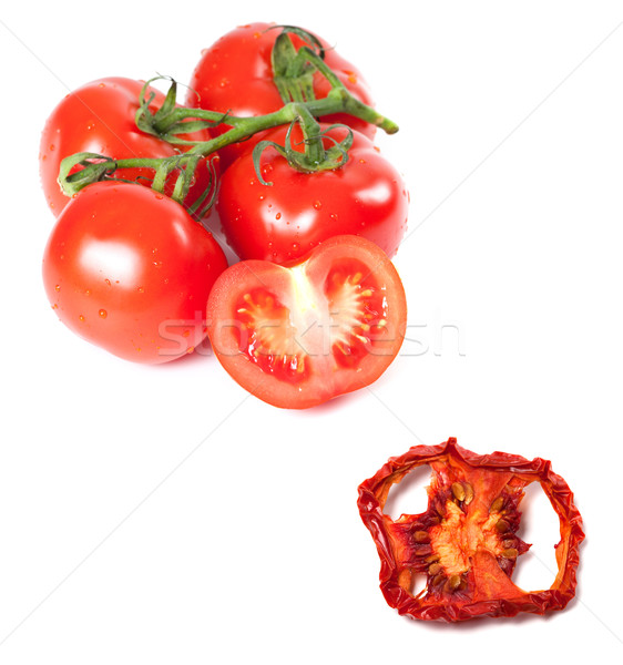 Bunch of fresh tomatoes with water drops and dried slice Stock photo © BSANI