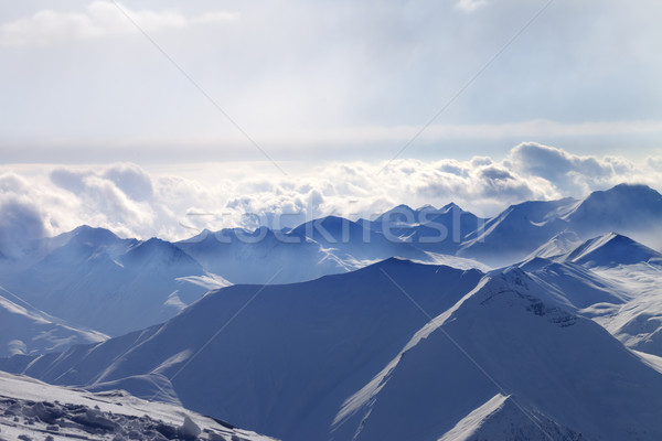 Foto stock: Silhueta · noite · luz · solar · montanhas · névoa · cáucaso