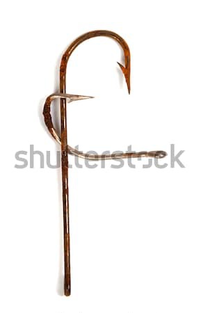 Letter F composed of old rusty fish hooks Stock photo © BSANI