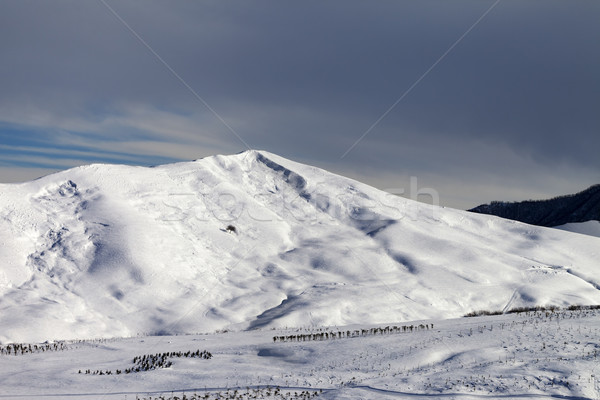 Snowy mountains at sun morning Stock photo © BSANI