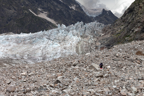 Hiker on glacier moraine Stock photo © BSANI