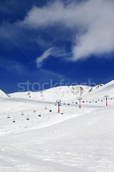 Chair-lift and ski slope at sun day Stock photo © BSANI