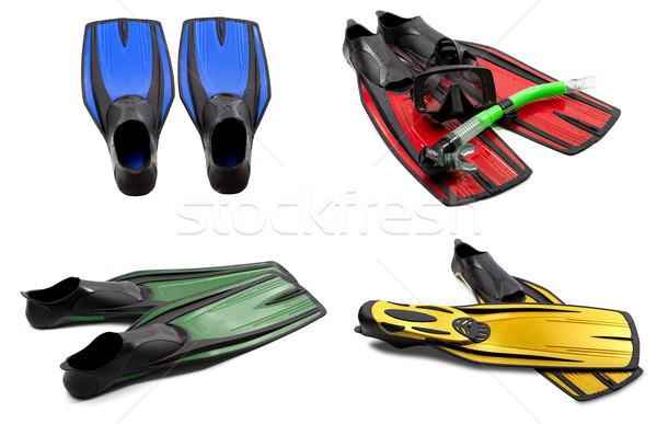 Set of multicolored swim fins, mask, snorkel for diving with wat Stock photo © BSANI